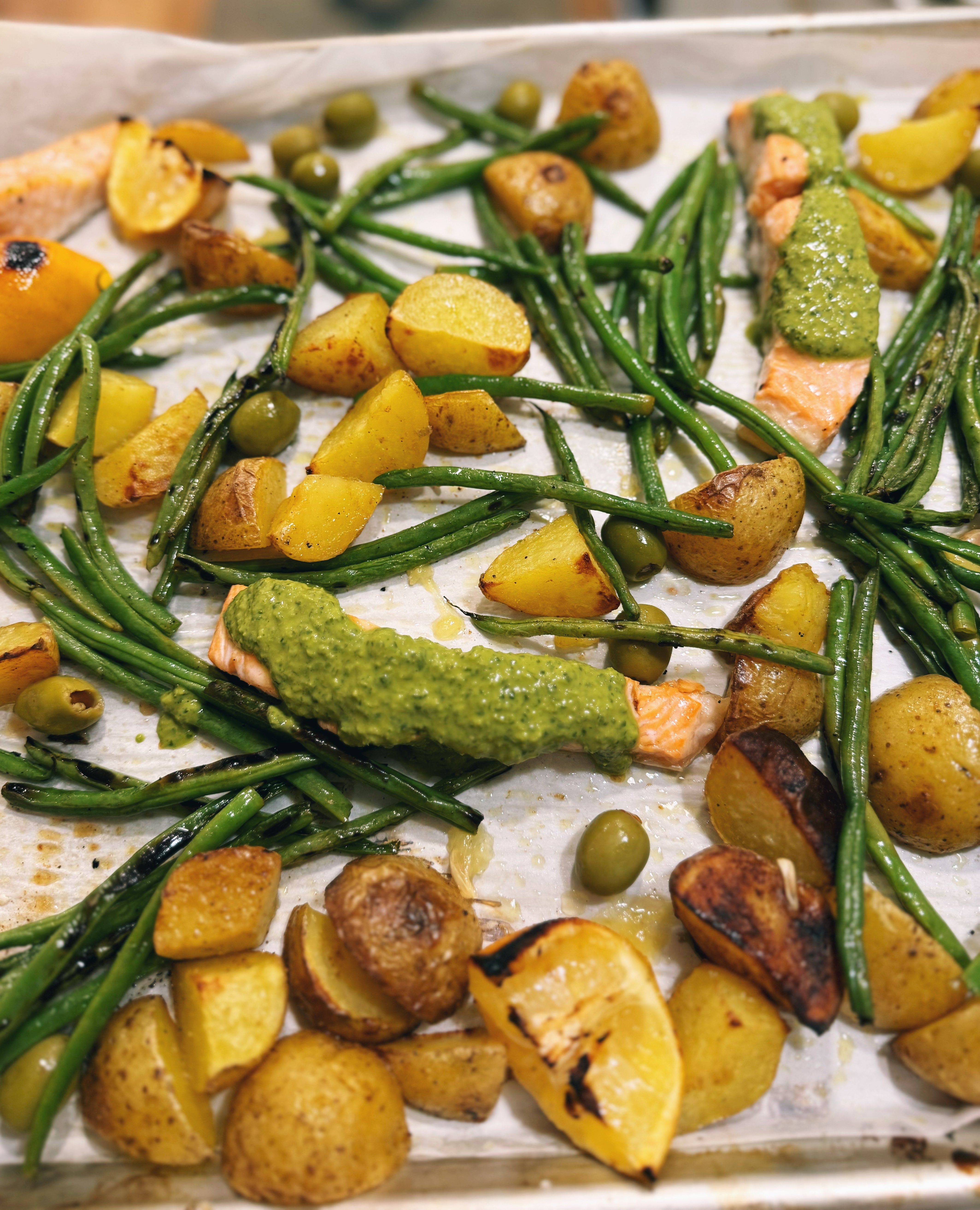 Sheet pan salmon with potatoes, green beans, and olives