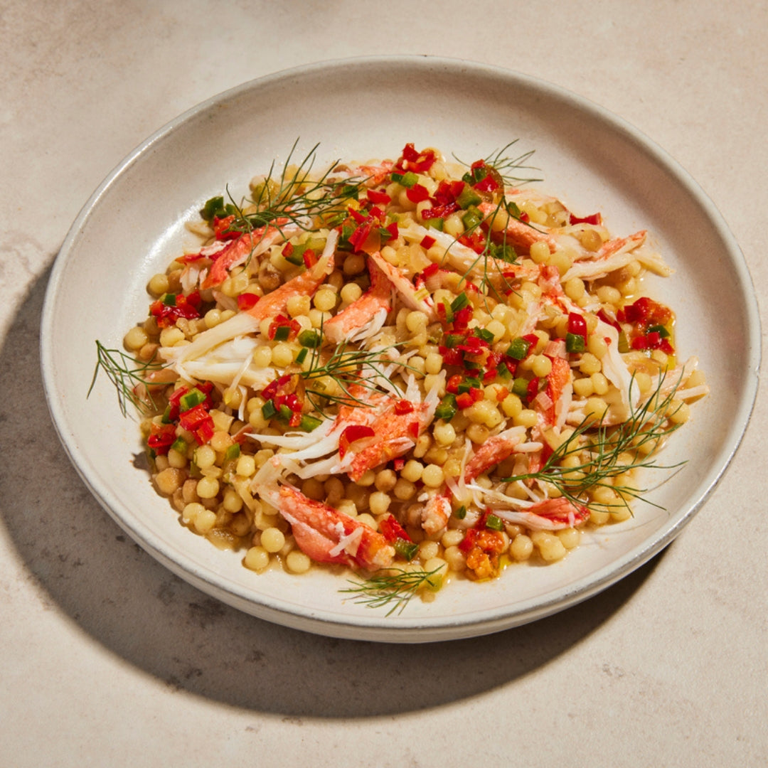 Wild Alaskan crab Fregola. Small toasted ball-shaped pasta with crab.
