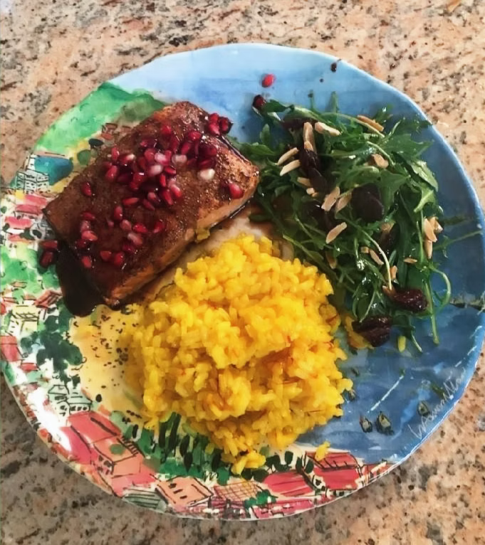 Pomegranate Molasses Glazed Copper River Salmon with Pistachio, Saffron Risotto, and Arugula Salad