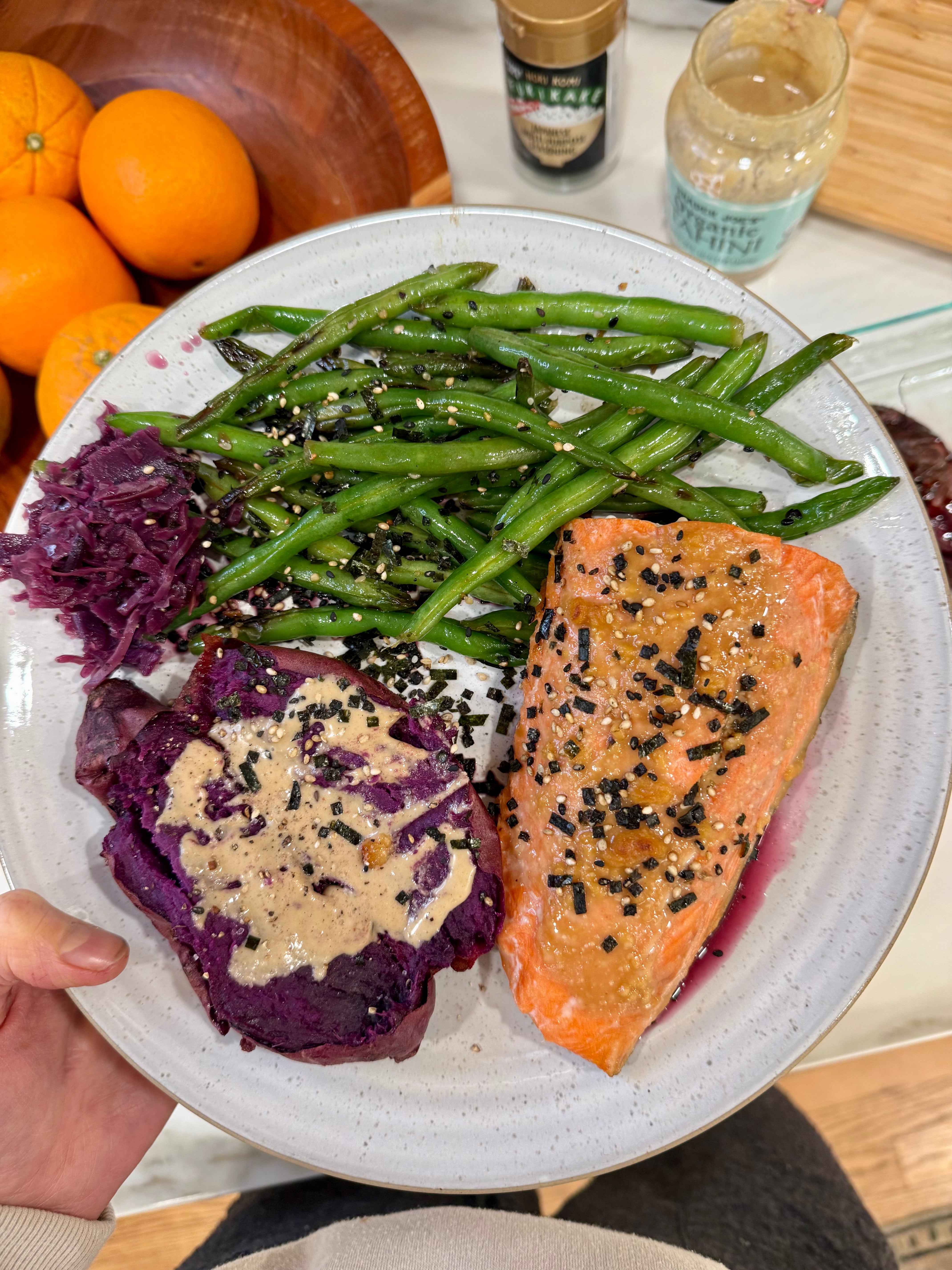 Miso salmon with purple potatoes, tahini drizzle and green beans